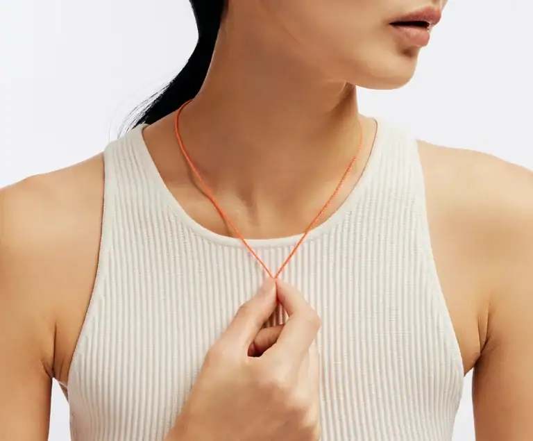 A cut length of string worn around the neck to show where that necklace length falls